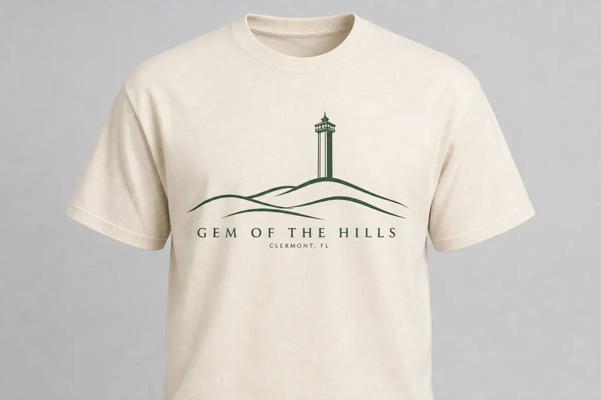 Cream Gem of the Hills tee with forest green Citrus Tower and hills